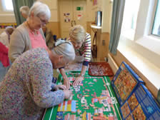 Co-operative jigsaw puzzle solving